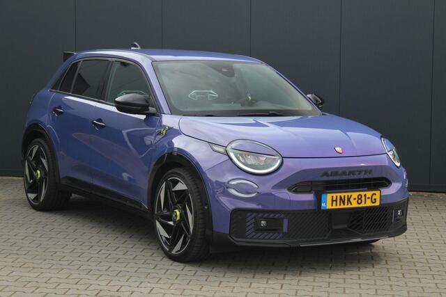 Abarth 600e Abarth Scorpionissima 54 kWh 282PK | Fabrieksgarantie | Kuipstoelen | Cruise control Adaptief | Apple Carplay/Android Auto | Parkeercamera | Half leder/alcantara | Voorruit verwarming | Parkeersensoren | Bluetooth | Navigatie |