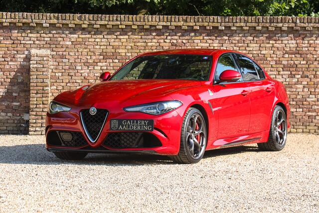 Alfa Romeo GIULIA 2.9 V6 Quadrifoglio Performance Edition "Manual and Carbon Seats by Sparco" Less than 25.000 km - 2 private owners and delivered new in the Netherlands,Rosso Competizione and dark 5-hole alloy wheels,Performance Edition: Manual gear - Carbon brakes - Harman Kardon, The last owner is a former Squadra Bianca driver with skills and experience, "A new M3 is for people who like cars - Safe choice so to speak - But a Quadrifoglio if you really get it",