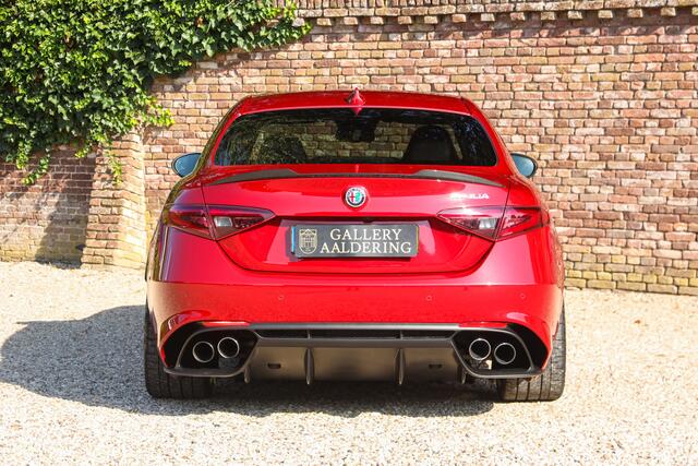 Alfa Romeo GIULIA 2.9 V6 Quadrifoglio Performance Edition "Manual and Carbon Seats by Sparco" Less than 25.000 km - 2 private owners and delivered new in the Netherlands,Rosso Competizione and dark 5-hole alloy wheels,Performance Edition: Manual gear - Carbon brakes - Harman Kardon, The last owner is a former Squadra Bianca driver with skills and experience, "A new M3 is for people who like cars - Safe choice so to speak - But a Quadrifoglio if you really get it",
