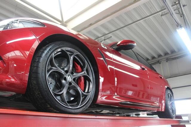 Alfa Romeo GIULIA 2.9 V6 Quadrifoglio Performance Edition "Manual and Carbon Seats by Sparco" Less than 25.000 km - 2 private owners and delivered new in the Netherlands,Rosso Competizione and dark 5-hole alloy wheels,Performance Edition: Manual gear - Carbon brakes - Harman Kardon, The last owner is a former Squadra Bianca driver with skills and experience, "A new M3 is for people who like cars - Safe choice so to speak - But a Quadrifoglio if you really get it",