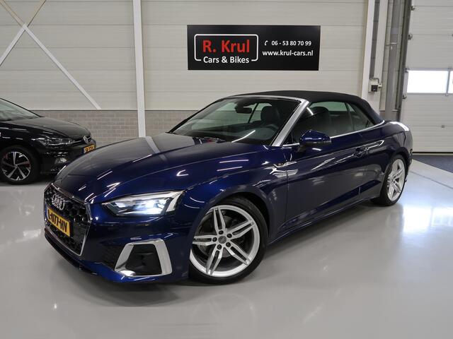 Audi A5 Cabriolet 40 TFSI Launch edition Sport S-Line Matrix Nekverwarming Trekhaak 3-Zone airco Digitaal Camera ACC Navigatie Automaat Alcantara Massagestoelen App connect 19 inch Sportvelgen Navarrablauw metallic Nieuwstaat