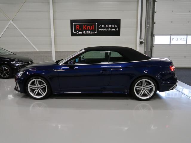 Audi A5 Cabriolet 40 TFSI Launch edition Sport S-Line Matrix Nekverwarming Trekhaak 3-Zone airco Digitaal Camera ACC Navigatie Automaat Alcantara Massagestoelen App connect 19 inch Sportvelgen Navarrablauw metallic Nieuwstaat