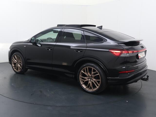 Audi Q4 Sportback e-tron 45 quattro S Edition 82 kWh | 286 PK | SoH 100% | Trekhaak | Panoramadak | Warmtepomp | Head-up display | S line | Fabrieksgarantie tot 02/2030 of 100.000km |