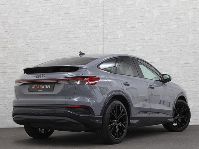 Audi Q4 Sportback e-tron 40 S-Line 77 kWh | Sportstoelen | H-Leder | ACC | Lane ass. | Virtual + | Black-Optic | Stoelverwarming | Camera | Matrix-Led | Getint Glas | Zwarte Hemelbekleding | MMi+ | 3-Zone Clima | Bovag Garantie |