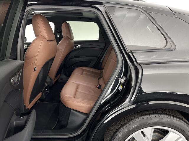 Audi Q4 e-tron 40 Launch edition S Competition 77 kWh [ 3-Fase-11kW ] {SOH-90%} (INCL-BTW) Aut. *HEATPUMP | PANO | LEATHER | MATRIX-LED | AUDI-SOUND | ADAPTIVE-CRUISE | HEATED-SPORTSEATS | AMBIENT-LIGHT | DIGI-COCKPIT | CAMERA | KEYLESS | DAB+ | 20''ALU*