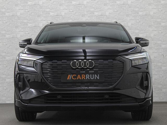Audi Q4 e-tron 40 77 kWh S-Line #RS-Leder | Black-Edition | ACC | Sfeerverlichting | Virtual-Cockpit | Stoelverwarming | 3-Zone Clima | Virtual-Cockpit | Camera | LED | Getint Glas | Carplay | Autom. Parkeren |