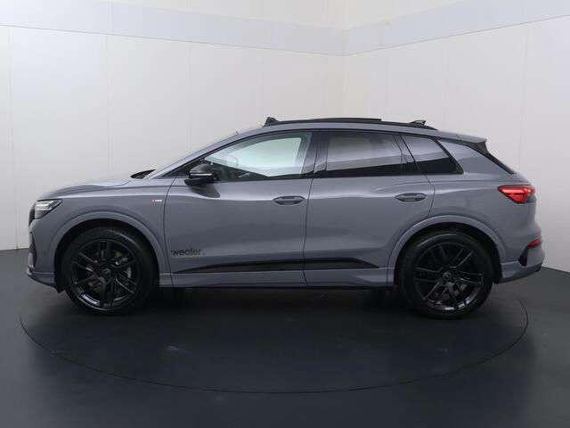 Audi Q4 e-tron S edition quattro performance 82 kWh - 340 PK / Dynamiekpakket plus / Augmented reality head-up display / S-line-interieur met sportstoelen en zwarte stoffen-kunstlederen bekleding / Lichtpakket plus met ambient lighting/ Matrix led koplampen / Panoramada