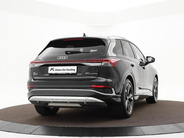 Audi Q4 e-tron 40 S edition 204pk / 77 kWh · SOH 97,4% · Panoramadak · Camera · Head-Up Display · Stoelverwarming · Apple/Android Car Play · Adaptive Cruise Control · 20"Velgen ·