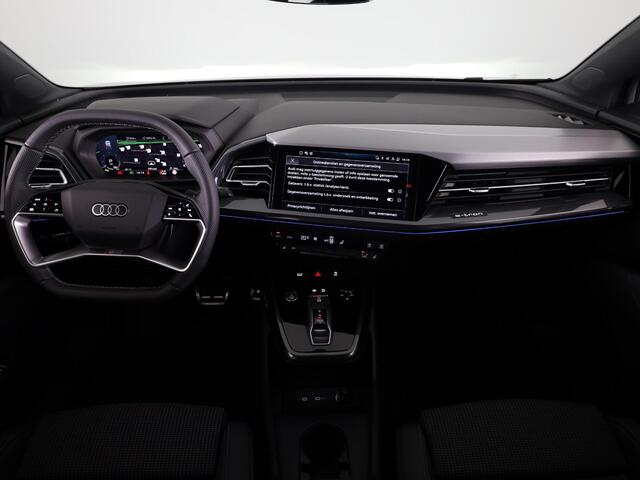 Audi Q4 e-tron 45 S edition Competition e-tron 82 kWh 286 pk | Navigatie | Stoelverwarming | Assistentiepakket plus | Comfortpakket | Ambient lichtpakket | Optiekpakket zwart plus | 20 inch Lichtmetalen velgen