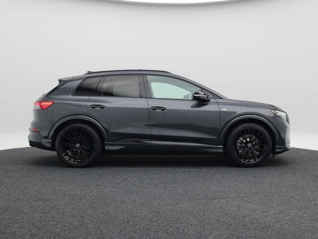 Audi Q4 e-tron S edition 45 | 82 kWh | 286 PK | 21 inch velgen | Privacyglas | Trekhaak | Panoramadak | Zwart optiek |