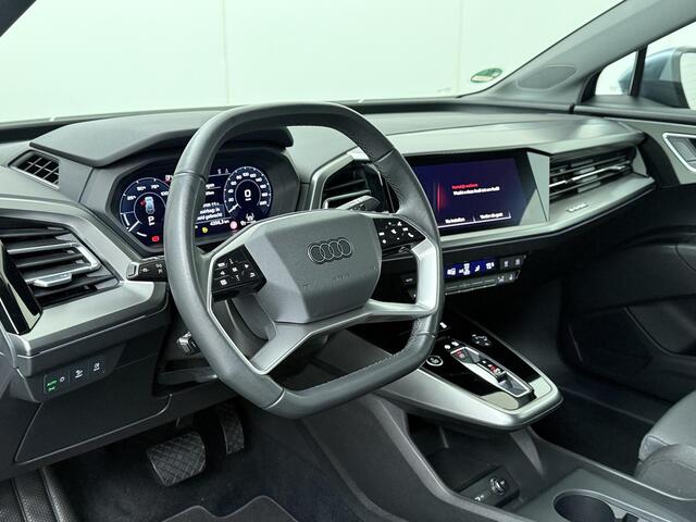 Audi Q4 e-tron 50 quattro Launch edition Advanced Plus 77 kWh | 299 PK | SoH 90% | Trekhaak wegklapbaar | Warmtepomp | Adaptive Cruise Control | Achteruitrijcamera | Climate control | Matrix LED | Elektrische achterklep | Navigatiesysteem | Stoelverwarming | Parkeersensoren | Apple Carplay / Android Auto |