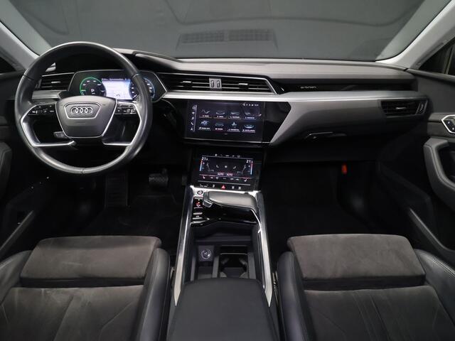 Audi e-tron 55 quattro Business edition Plus 95 kWh [TREKHAAK AFNEEMBAAR, LUCHTVERING, SCHUIFKANTELDAK, MEMORY SEATS, APPLE CARPLAY, ANDROID, SPORTSTOELEN, ADAPTIVE CRUISE, PDC V+A, STOELVERWARMING, NIEUWSTAAT]