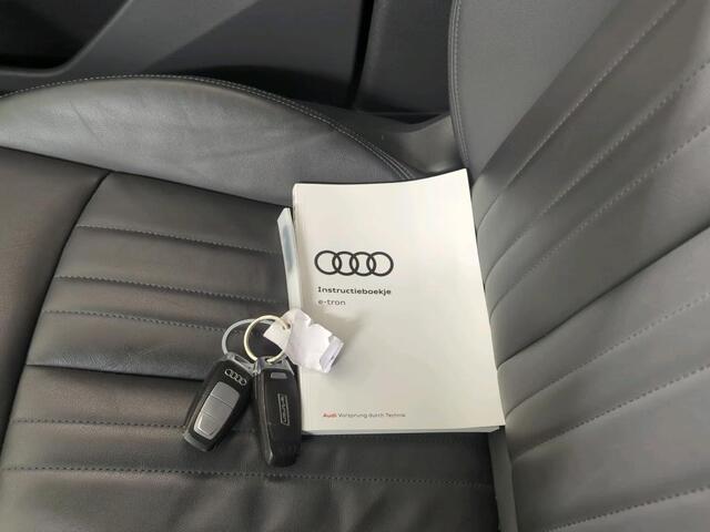 Audi e-tron 55 Quattro Business edition Plus 95 kWh PANO TREKHAAK LEER