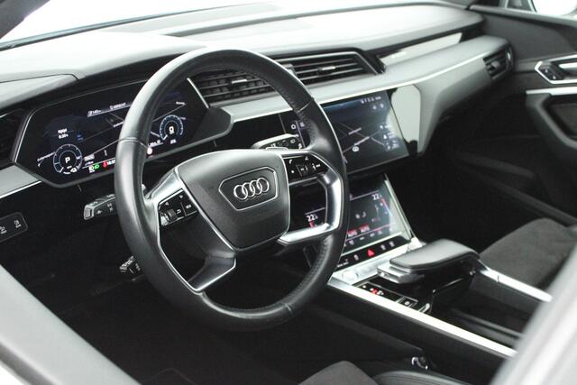 Audi e-tron 55 quattro 95 kWh 408pk SOH 95% Trekhaak 360Camera ACC Keyless Stoelverwarming Memory Navigatie