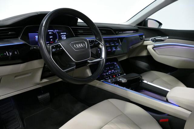 Audi e-tron 55 quattro Business Edition Plus 95 kWh / Panoramadak / Elektr. verstelbare voorstoelen (links memory) / Luchtvering / Apple Carplay - Android Auto / Ambienteverlichting / Matrix LED koplampen / Stoelverwarming / Achteruitrijcamera / Adaptive Cruise Contr