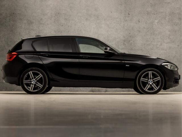 BMW 1-SERIE 118i Sportline Automaat (NAVIGATIE, CLIMATE, M SPORT STUUR, GETINT GLAS, SPORTSTOELEN, PARKEERSENSOREN, CRUISE, LED KOPLAMPEN, TREKHAAK, NIEUWE APK, NIEUWSTAAT)