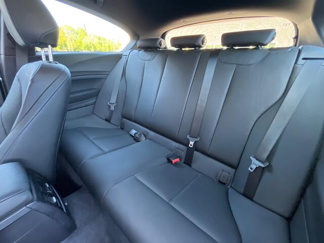 BMW 1-SERIE 118i Edition M Sport Shadow High Exe. / Leder / Navigatie / Parkeerhulp V+A / 18'' / Stoelverwarming / Cruise Control