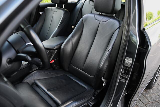 BMW 1-SERIE 118i High Executive Automaat / Schuif-kanteldak / Sportstoelen / LED / M Sportonderstel / Stoelverwarming / Cruise Control