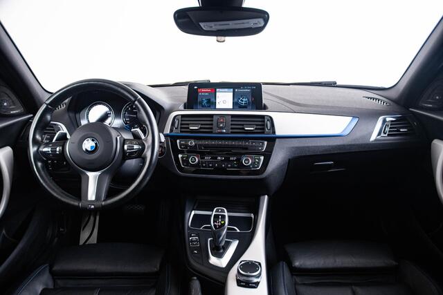 BMW 1-SERIE M140i High Executive Schuif/kanteldak - Comfort Access - Cruise Control - Driving Assistant - Variable Sport Steering - Sportstoelen - Verwarmde voorstoelen - HiFi System Harman Kardon - Lichtpakket -