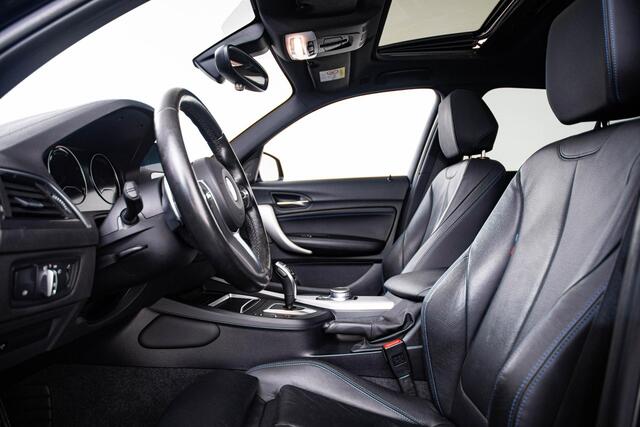 BMW 1-SERIE M140i High Executive Schuif/kanteldak - Comfort Access - Cruise Control - Driving Assistant - Variable Sport Steering - Sportstoelen - Verwarmde voorstoelen - HiFi System Harman Kardon - Lichtpakket -