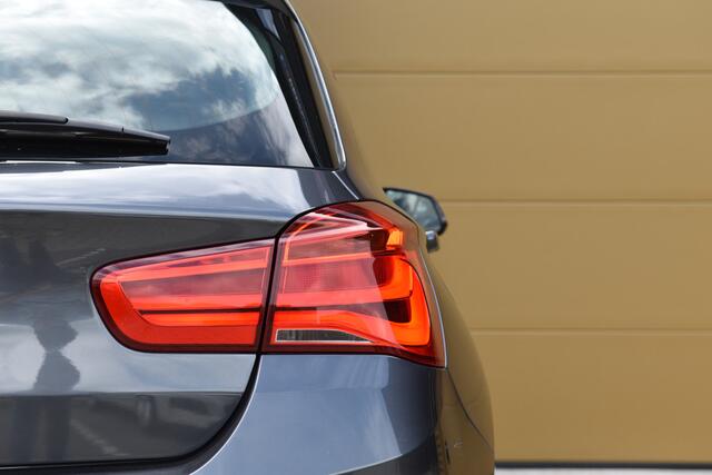 BMW 1-SERIE 120i Centennial High Executive * M Sportpakket * Glasdak * Navigatie Professional * LED * Leder *