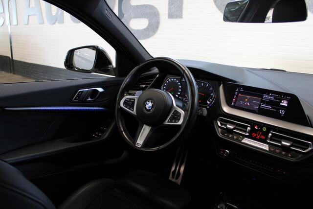 BMW 1-SERIE M135i xDrive High Executive | Akrapovic uitlaatsysteem | Cruise control | Climate control | Stoelverwarming | Apple carplay/Android auto | DAB radio | Dealer onderhouden |