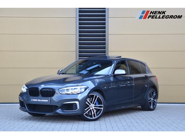 BMW 1-SERIE M140i High Executive * Elektrische stoelen * Harman Kardon * DAB * Leder * Grootlichtassistent *