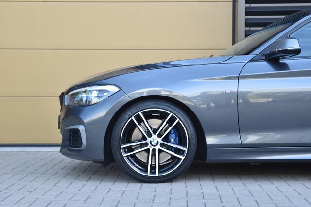 BMW 1-SERIE M140i High Executive * Elektrische stoelen * Harman Kardon * DAB * Leder * Grootlichtassistent *