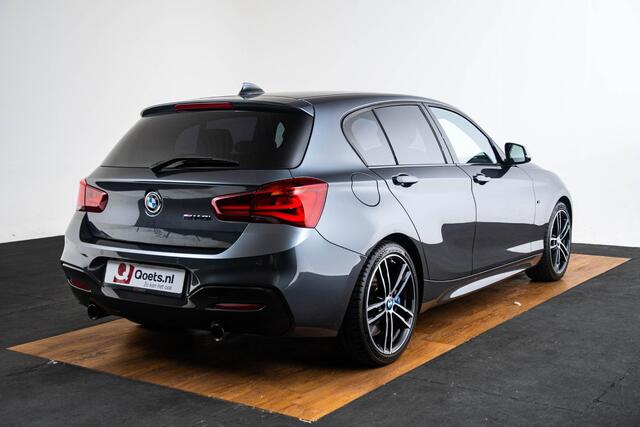 BMW 1-SERIE M140i xDrive High Executive Harman Kardon - Elektrisch verwarmde voorstoelen - Sportstoelen - Cruise Control - Achteruitrijcamera - PDC Voor/Achter - Middenarmsteun voor - Adaptieve LED koplampen -