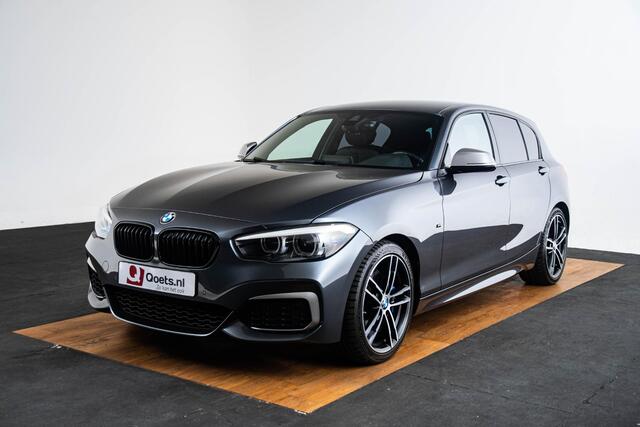 BMW 1-SERIE M140i xDrive High Executive Harman Kardon - Elektrisch verwarmde voorstoelen - Sportstoelen - Cruise Control - Achteruitrijcamera - PDC Voor/Achter - Middenarmsteun voor - Adaptieve LED koplampen -