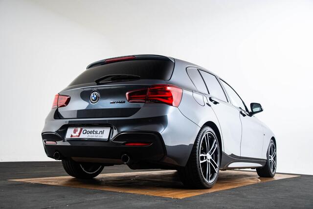 BMW 1-SERIE M140i xDrive High Executive Harman Kardon - Elektrisch verwarmde voorstoelen - Sportstoelen - Cruise Control - Achteruitrijcamera - PDC Voor/Achter - Middenarmsteun voor - Adaptieve LED koplampen -