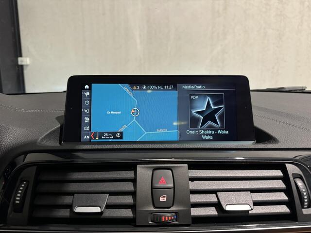 BMW 1-SERIE 118i High Executive Aut. | schuifdak | leder | navi | led |