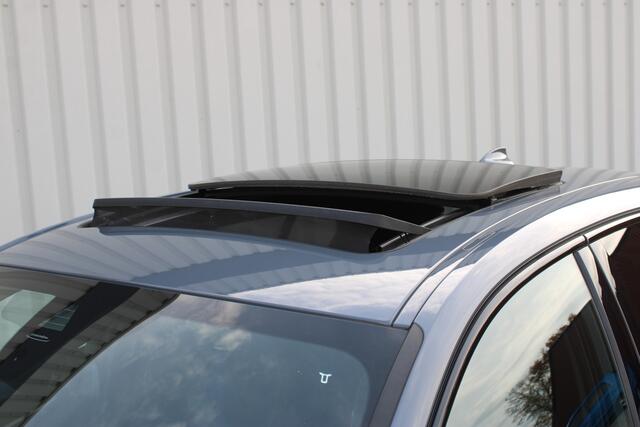 BMW 1-SERIE 118i High Executive M-sport | Incl. 12 maanden garantie | Cruise control | Kuipstoelen | Schuif/kantel dak | Climate control | Apple carplay | Navigatie | DAB radio | Harman/Kardon |