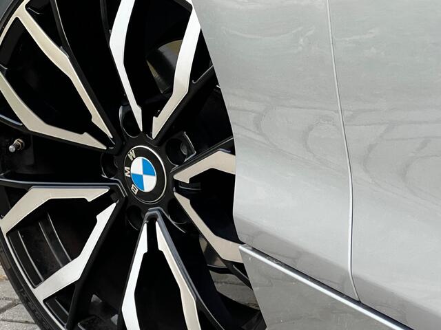 BMW 1-SERIE 116d Sport Automaat / Airco / Schuif-Kanteldak / Navigatie / Sport Int / LM Velgen / Trekhaak