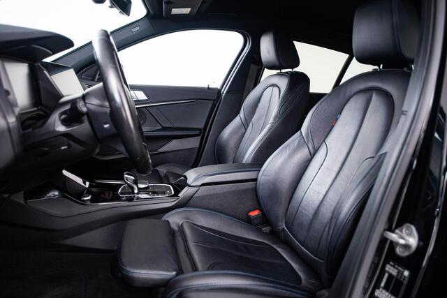 BMW 1-SERIE 118i High Executive M Sport - Sportstoelen - Stoelverwarming - PDC Voor/Achter - Cruise control - Getinte Ruiten - High Beam Assistant - Multifunctioneel stuurwiel - Elektrische verstelbare lendensteunen -