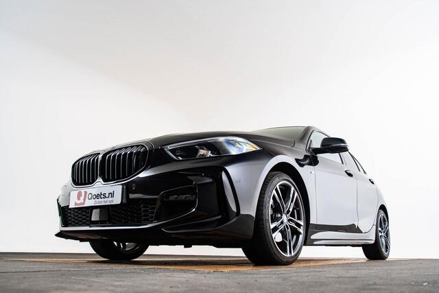 BMW 1-SERIE 118i High Executive M Sport - Sportstoelen - Stoelverwarming - PDC Voor/Achter - Cruise control - Getinte Ruiten - High Beam Assistant - Multifunctioneel stuurwiel - Elektrische verstelbare lendensteunen -