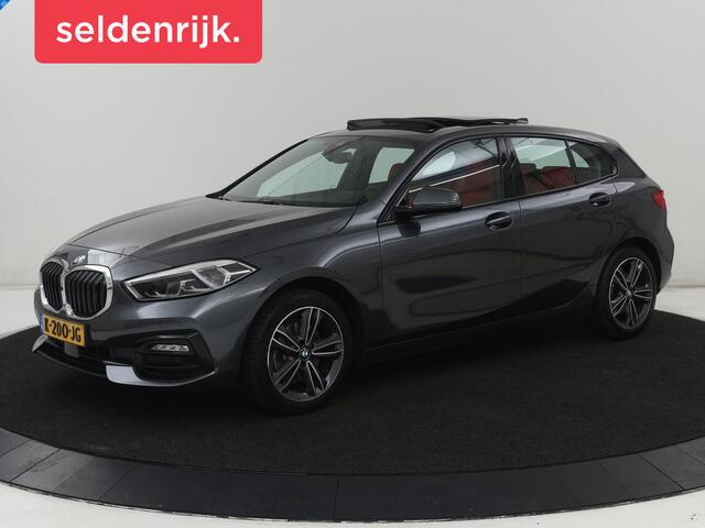 BMW 1-SERIE 118i High Executive | Sport Line | Panoramadak | Leder | Stoelverwarming | Keyless | Live Cockpit | Carplay | Sportstoelen | Navigatie | Spiegel Pakket | Parkeerhulp | Climate control