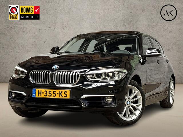 BMW 1-SERIE 120i Sport Line Shadow High Executive 184Pk Automaat (SCHUIFDAK, GROOT NAVI, DEALER ONDERHOUDEN, MEMORY SEATS, LEDER, STUUR/STOELVERWARMING, PARKEERSENSOREN, TREKHAAK, NIEUWSTAAT)