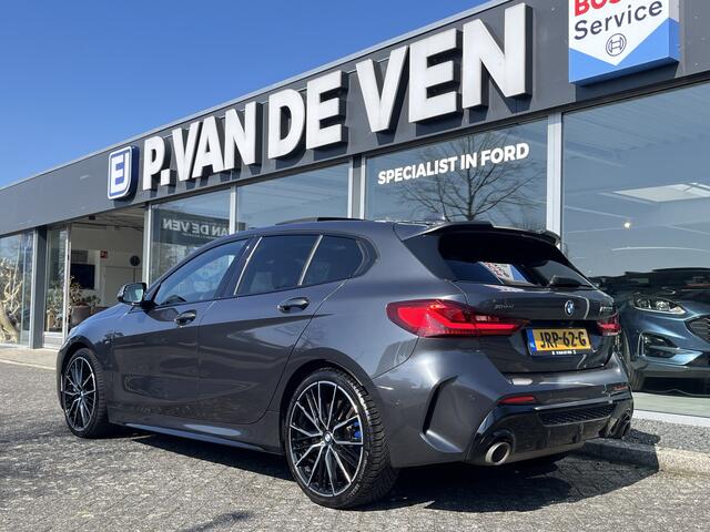 BMW 1-SERIE M135i xDrive High Executive M Sport 306pk Automaat | Panodak | Elektr. achterklep | arking Pakket | Spiegel Pakket | Draadloze telefoonlader | etc. etc.