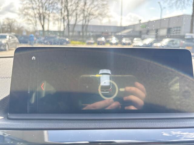 BMW 1-SERIE 118i Sport Line Edition | Stoelverwarming | Cruise Control | Parkeersensoren | Navigatie | Groot Scherm | Digitale Tellers | Automaat | Keyless | Trekhaak | LED