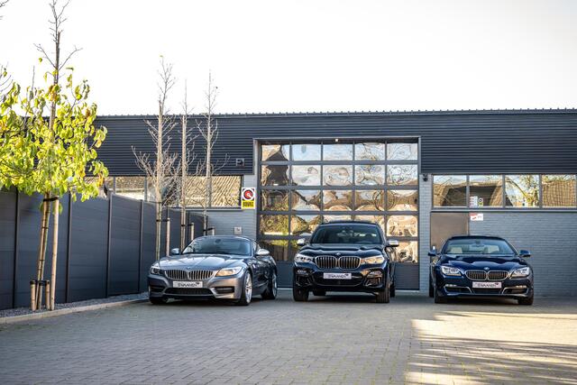 BMW 1-SERIE 118i Executive | Leer | Trekhaak
