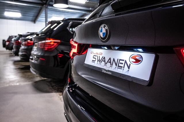 BMW 1-SERIE 118i Executive | Leer | Trekhaak