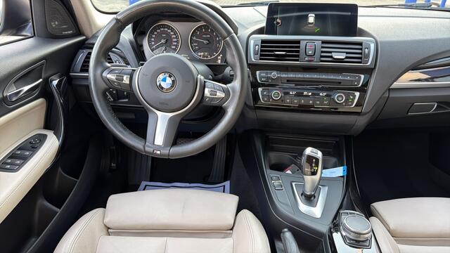 BMW 1-SERIE 118i Centennial High Executive | AUTOMAAT | PANODAK | LEER
