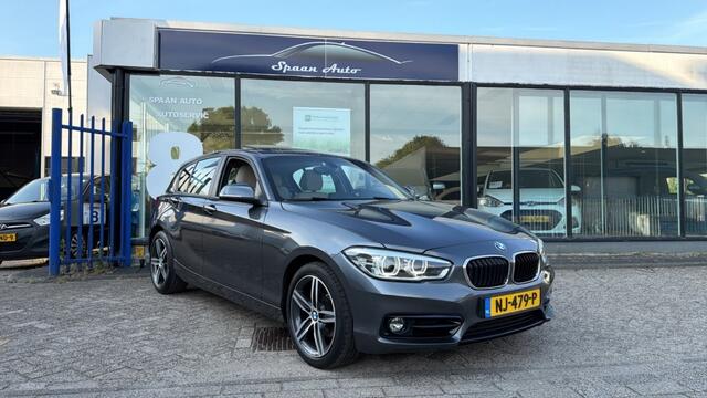 BMW 1-SERIE 118i Centennial High Executive | AUTOMAAT | PANODAK | LEER