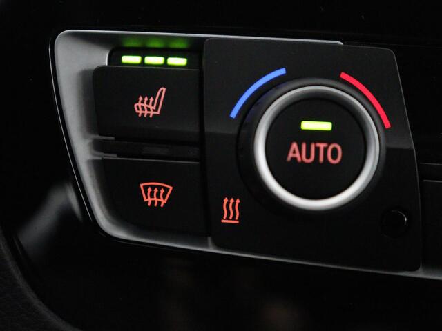 BMW 1-SERIE 118i High Executive M-sport | Leder | Full LED | Climate control | Stoelverwarming | Park assist | Cruise control | DAB | Bluetooth | Sfeerverlichting |