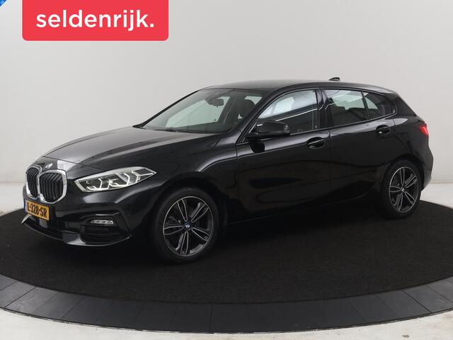 BMW 1-SERIE 118i Business Edition | Half leder | Cruise control | Stoelverwarming | Navigatie | Carplay | Park assist | Climate control | Virtual dashboard | 17" velgen
