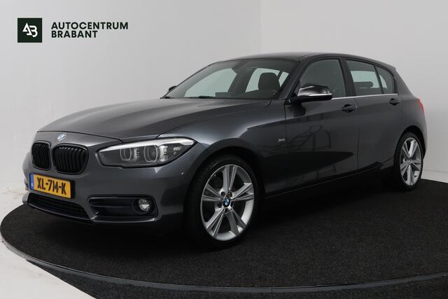 BMW 1-SERIE 118i Executive (NAVIGATIE, CAMERE, SPORTSTOELEN, PARKEERSENSOREN)