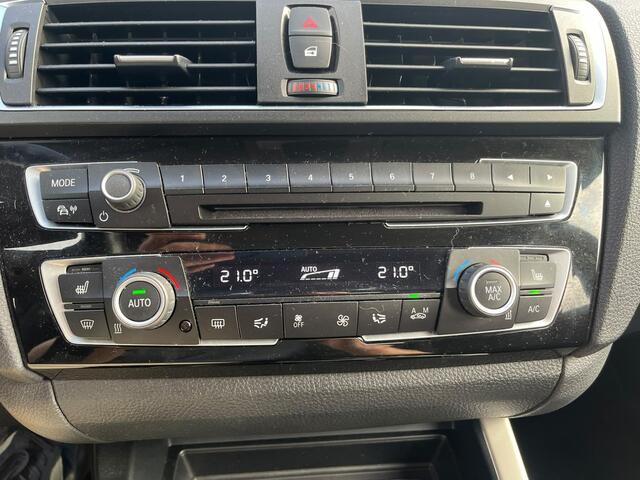 BMW 1-SERIE 118i | 136PK | Black edition | Advantage | Trekhaak | PDC | Climate | Stoelverw. | ACC