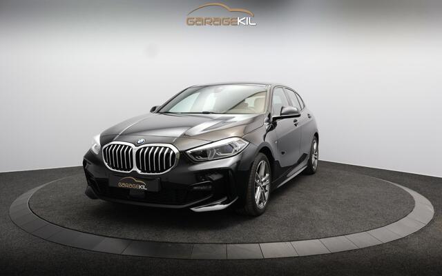 BMW 1-SERIE 118i M Sport Dealeronderh. / Illuminated Boston / LED / Draadloos laden / Stoelverwarming / Panoramadak / PDC