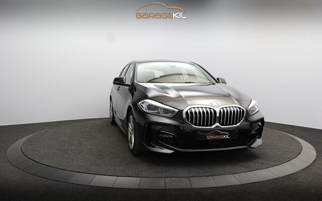 BMW 1-SERIE 118i M Sport Dealeronderh. / Illuminated Boston / LED / Draadloos laden / Stoelverwarming / Panoramadak / PDC
